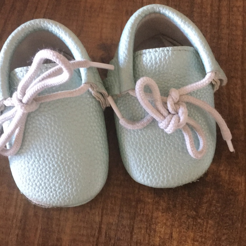 Gently turquoise moccasins